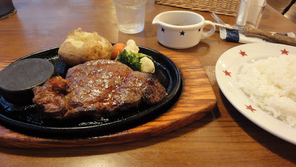 steak with baked potato and vegetables